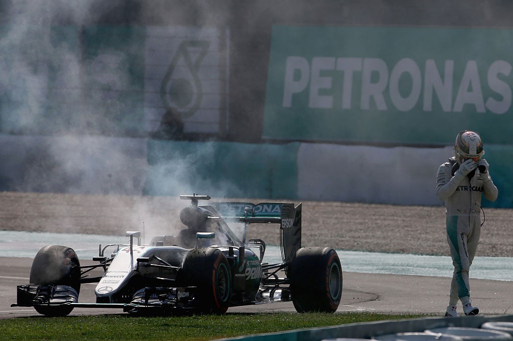 KUALA LUMPUR, MALAYSIA - OCTOBER 02: Lewis Hamilton of Great Britain driving the (44) Mercedes AMG Petronas F1 Team Mercedes F1 WO7 Mercedes PU106C Hybrid turbo retires from the grand prix during the Malaysia Formula One Grand Prix at Sepang Circuit on October 2, 2016 in Kuala Lumpur, Malaysia. (Photo by Charles Coates/Getty Images)