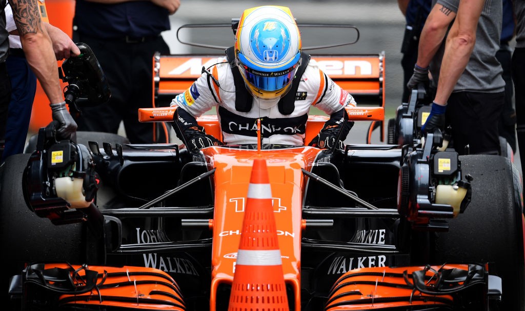 McLaren's Spanish driver Fernando Alonso steps out of his car after the third practice session for the Formula One Chinese Grand Prix in Shanghai on April 8, 2017. / AFP PHOTO / Johannes EISELE (Photo credit should read JOHANNES EISELE/AFP/Getty Images)