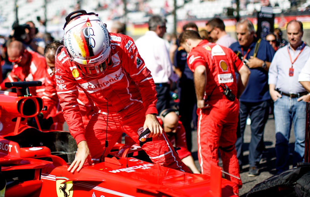 SUZUKA, JAPAN - OCTOBER 08: Sebastian Vettel of Germany and Ferrari prepares to drive on the grid before the Formula One Grand Prix of Japan at Suzuka Circuit on October 8, 2017 in Suzuka. (Photo by Lars Baron/Getty Images)
