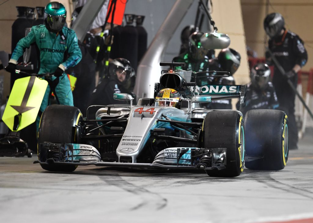 Mercedes' British driver Lewis Hamilton leaves the pit lane during the Bahrain Formula One Grand Prix at the Sakhir circuit in Manama on April 16, 2017.  / AFP PHOTO / POOL / Andrej ISAKOVIC        (Photo credit should read ANDREJ ISAKOVIC/AFP/Getty Images)